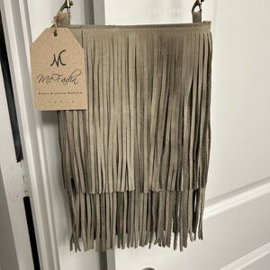 Brand new McFadin leather fringe crossbody purse.